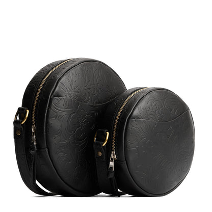 Dahlia | Size comparison image of small and large circle shaped crossbody bags with top zipper