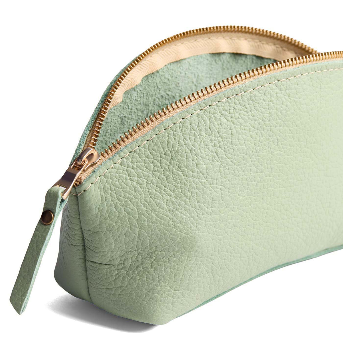 Pistachio | Spacious leather makeup bag with curved seams and top zipper