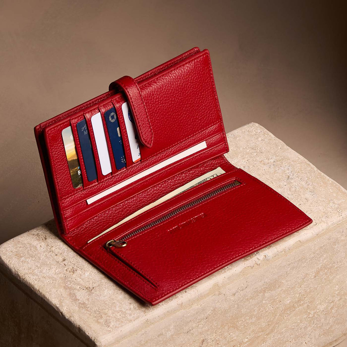 Icon Red*Extra Large | Leather bifold wallet with a strap and bar closure