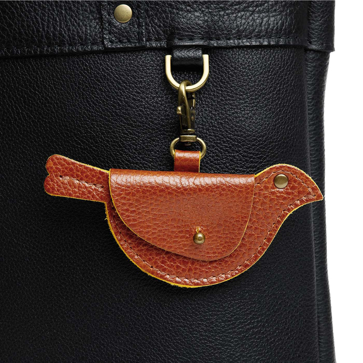 Sienna | Bird shaped pouch with button closure and lobster clasp