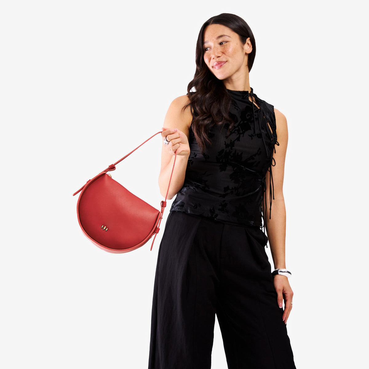 Ruby | Model wearing a rounded structured shoulder bag