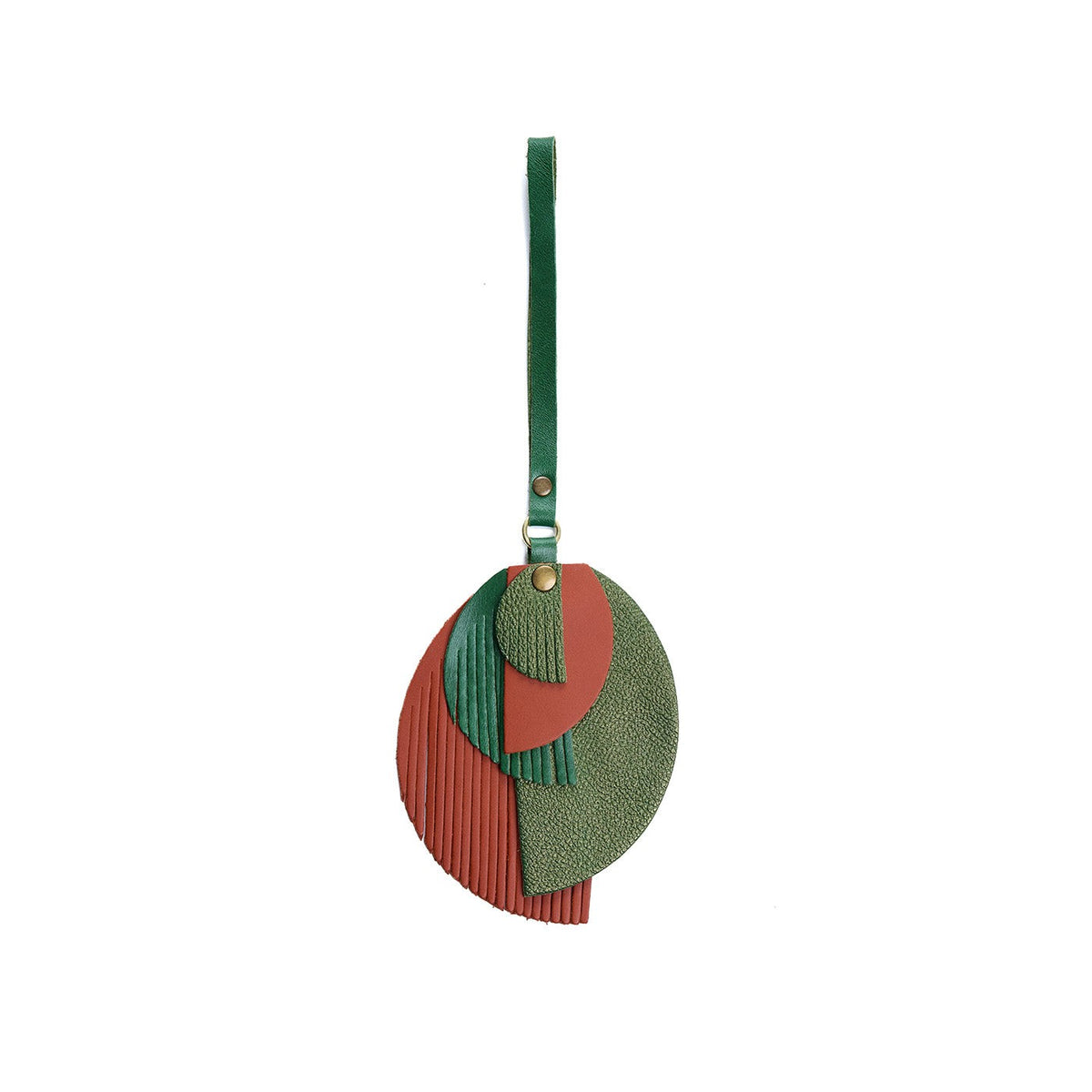 Jungle | Intricately cut leather shapes and fringe