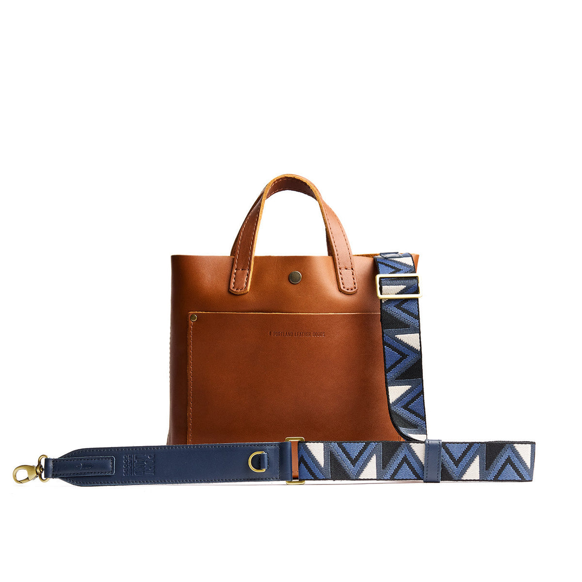 Deep Coast | Adjustable fabric and leather strap with zig zag pattern on a leather tote bag